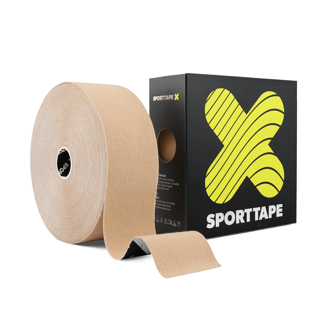 A roll of tan SPORTTAPE 22m kinesiology tape with a strip unrolled, positioned next to its black packaging box featuring a yellow X logo.