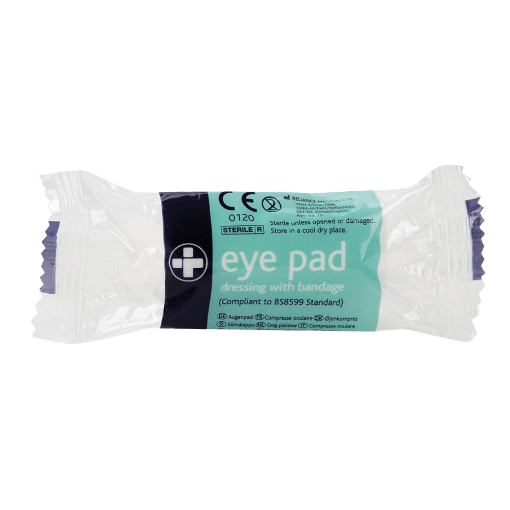 Eye pad dressing with bandage packaging on a green background