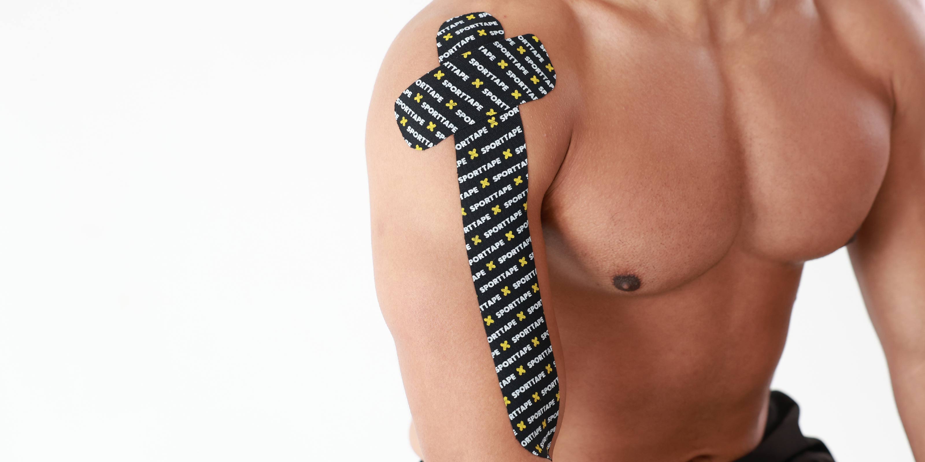 Kinesiology Tape on bicep and top of shoulder