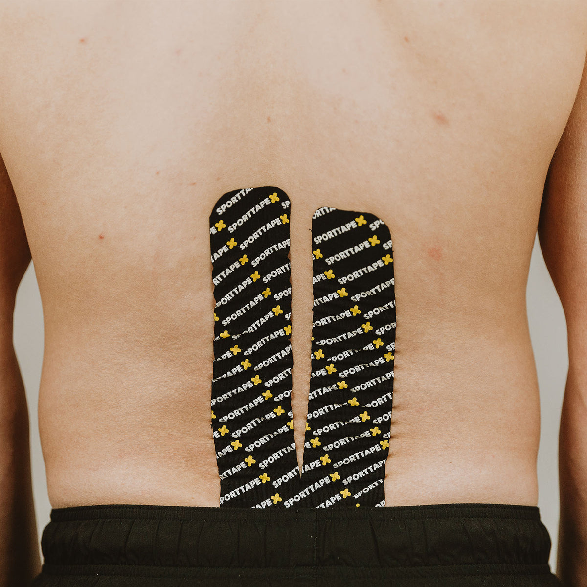 Back Tape How to Kinesiology Tape the Lower Back