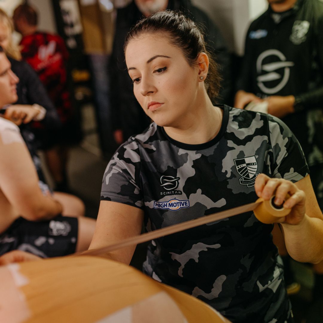 Image of Kathryn Deverson at work for Pontypridd RFC which is being used for our Rugby/Hockey physio blog. 